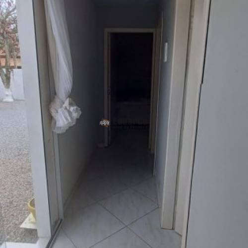 TERRENO COM DUAS CASAS ALVENARIA