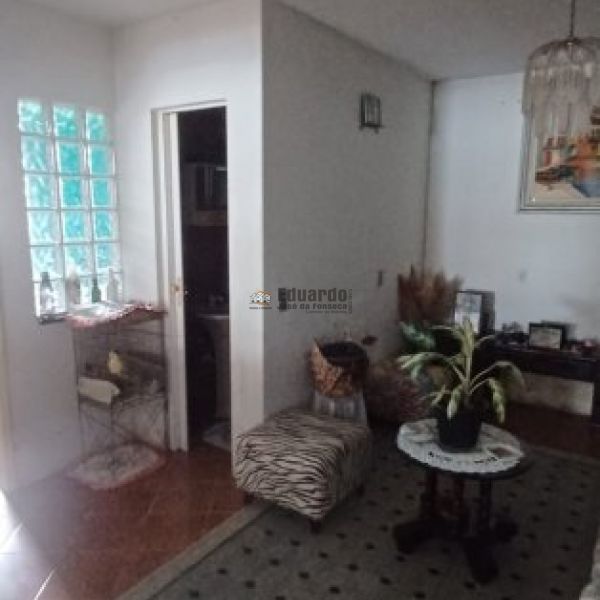 TERRENO COM DUAS CASAS ALVENARIA