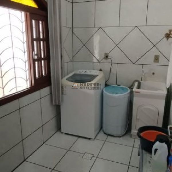 CASA NO CENTRO DE PORTO BELO