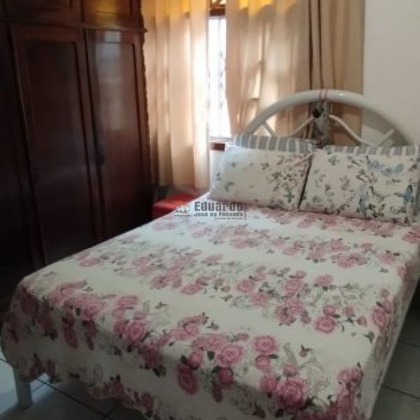 CASA NO CENTRO DE PORTO BELO