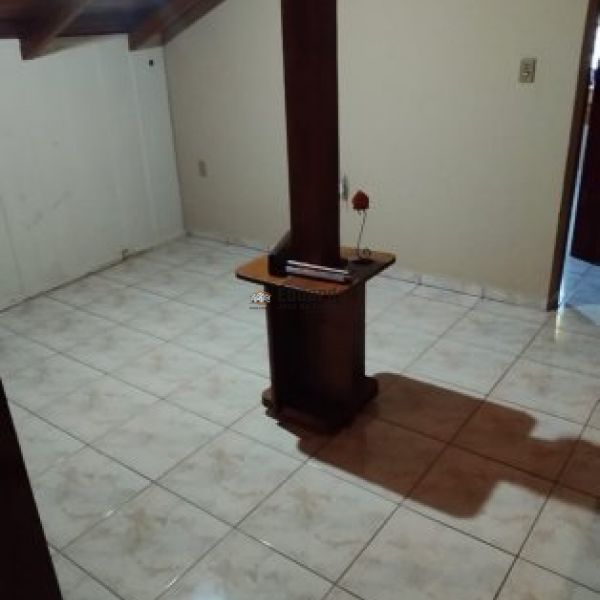 CASA NO CENTRO DE PORTO BELO