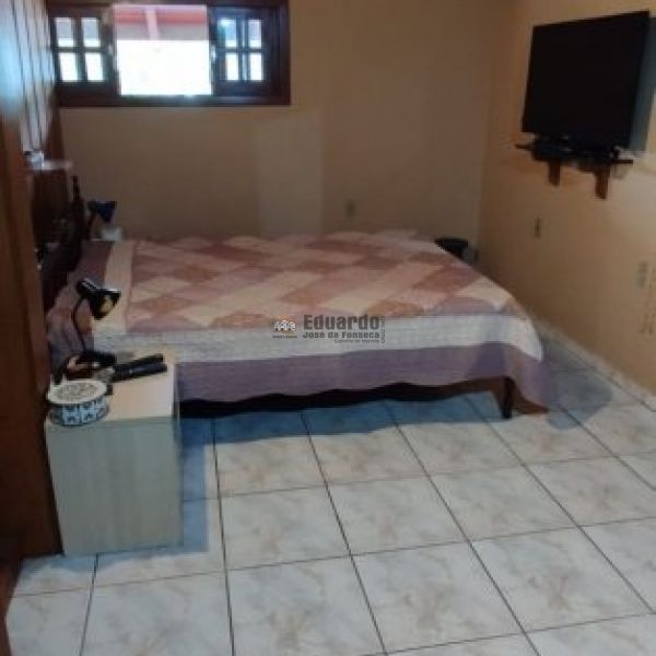 CASA NO CENTRO DE PORTO BELO