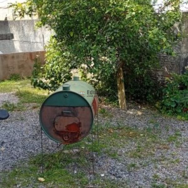 CASA COM 03 DORMITRIOS NO CENTRO DE PORTO BELO