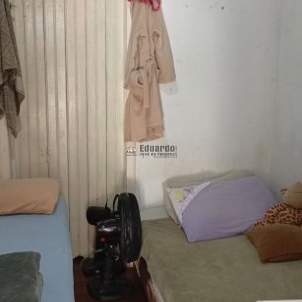 CASA A POUCOS METROS DA PRAIA ARA�A