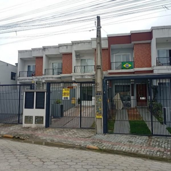 SOBRADO COM DUAS SU�TES E DUAS VAGAS