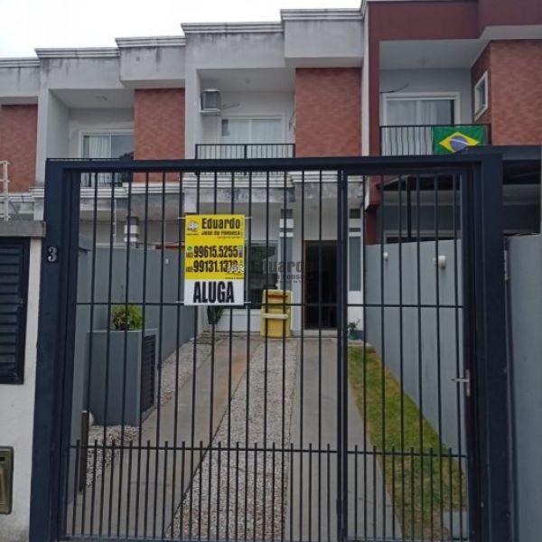 SOBRADO COM DUAS SU�TES E DUAS VAGAS